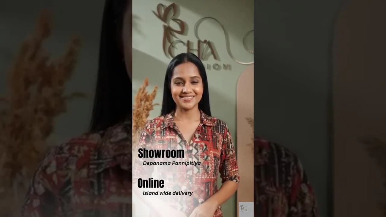 Vertical fashion-showroom video frame featuring a smiling presenter